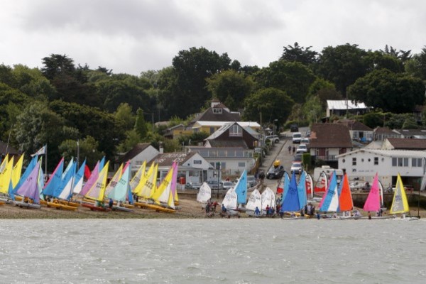 Sailing yachts with brightly coloured sails