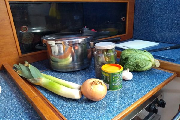 Food Ingredients on a blue counter in the galley onboard a boat