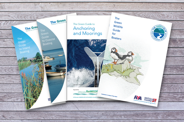 Image of the front covers of the four Green Boating Guides