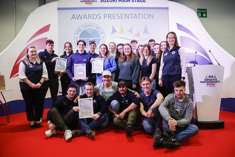 Winners of the University Sailing Sustainability Challenge on stage at the RYA Dinghy and Watersports Show 2022