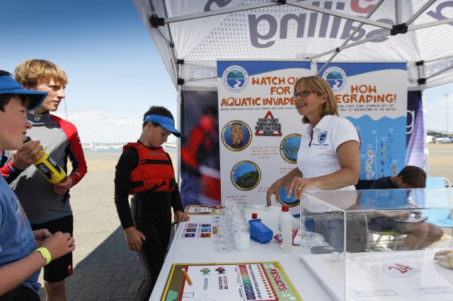 Landscape of educational activity being run under a gazebo at a sailing event
