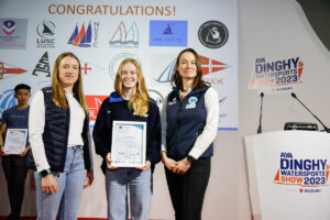 Bath Sailing Club collect their prize on stage with Kate Fortnam and Olivia Wells.