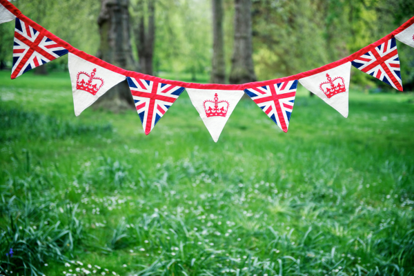 Bunting with the union jack pattern hanging in a forest
